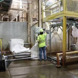 worker inside Covia plant
