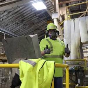 worker inside Covia plant