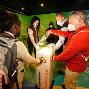 Group uses teamwork, communication and problem solving in Creators Wanted escape room