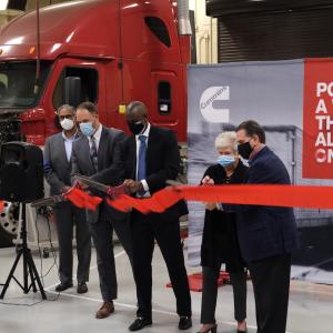 From left: TCAT Nashville diesel technology student Jonathan Ellis (holding ribbon on left), Deepak Gupta of Cummins, TCAT Nashville President Nathan Garrett, Tosin Tomori of Cummins, Tennessee Board of Regents Members Emily Reynolds and Joey Hatch