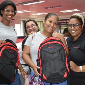 Students in the Dominican Republic shown with new backpacks provided by HanesBrands.
