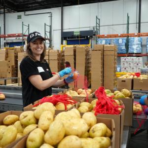 AEG volunteers spent the day sorting and packing fresh produce for distribution across the county.