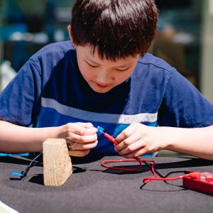 Boy working on science project