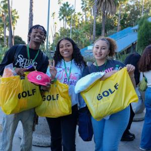 Attendees leaving with gift bags