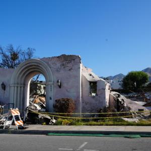 The Altadena Community Church facade still stands six months after the Eaton fire ripped through the community of Altadena. (Tony Morain/Direct Relief)