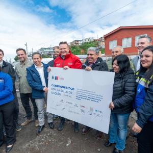 Group of people holding a certificate