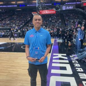 Tom Tran pictured on the sidelines at a game. 