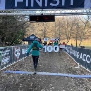 Lulu crossing the Rabid Raccoon 100 finish line.