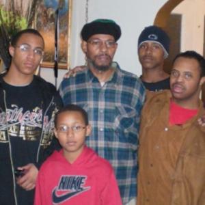 Hakim’s father (center) is surrounded by Hakim’s sons.
