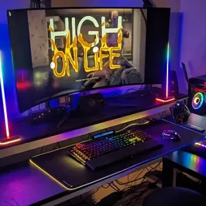 computer monitor and keyboard with colorful lights