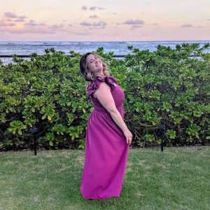 Danielle pictured in front of the sea.