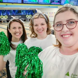 Danielle and two others at a bowling alley