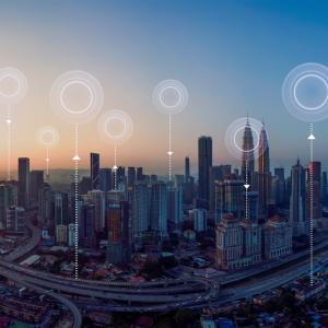 Cityscape showing data centers illustrated with balloons. 