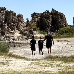 David Brabham walking outside with family 
