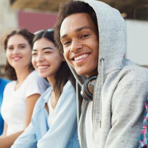 Group of seated young adults.