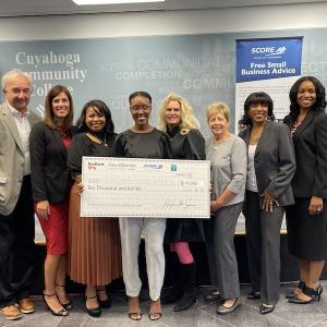 Danisha Anderson with Pitch Contest Judges.