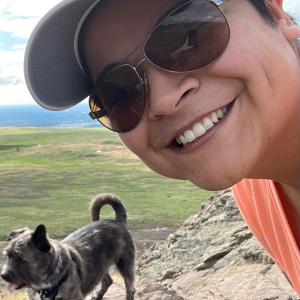 Denisse De la Cruz outside with dog