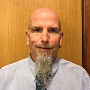 Headshot of Dennis Lyle