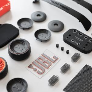 Parts for the JBL Party Box laid out on a table.