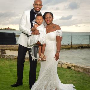Dexter Thompson and family in wedding attire.