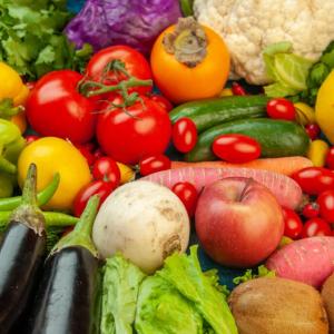 Tabletop with fruits and vegetables.