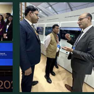 A person wearing a suit, talking to two other people