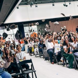 Hat toss at Coach Dream Day event