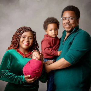 Dwayne, his wife and two children.