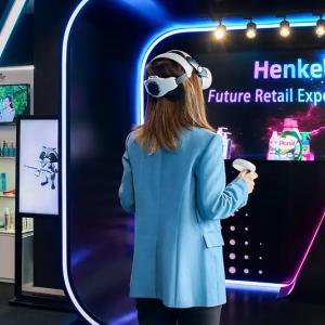 A person using a VR headset in an interactive room.