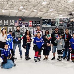 Al Montoya poses with youth from 24 Degrees of Color. Photo credit: Jason C Williams Photography