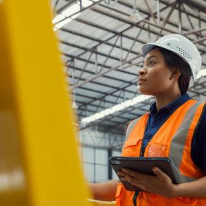 Female engineer looks out at a project