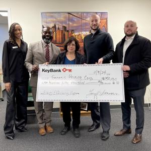 Leaders from KeyBank made a check presentation to Genesis Housing on February 9th.  Pictured from left are KeyBank Branch Manager Ashley Bowen; KeyBank Corporate Responsibility Officer Chiwuike Owunwanne; Genesis Housing Executive Director, Judith Memberg; KeyBank Market President and Market Retail Leader, Youseff Tannous; KeyBank Area Retail Leader Robert Lombardo.
