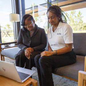 Ebony sat down on a couch with coworker Pleshette Williams, an administrative assistant at Rayonier’s Headquarters.
