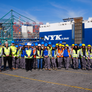 Students at the port terminal in San Antonio, in front of Car Carrier Ship and Cranes