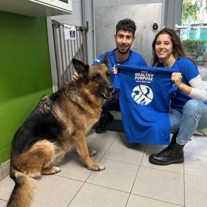 Elanco employees with dog 