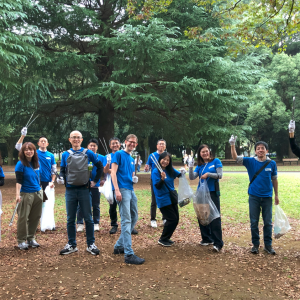elanco employees holding trash bags