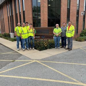 Workers standing outside of Elco Covia plant