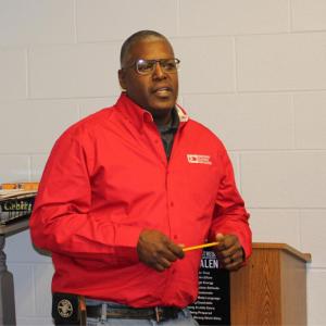 Person standing at lectern