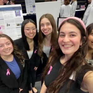 Emily Jacobs, far left, of Medtronic, with the group of young innovators.