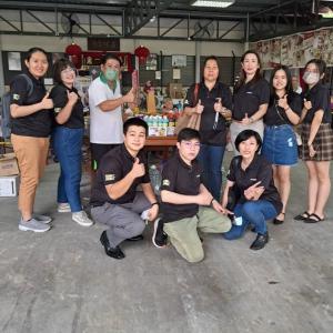 Arrow employees helping at a food bank in Malaysia