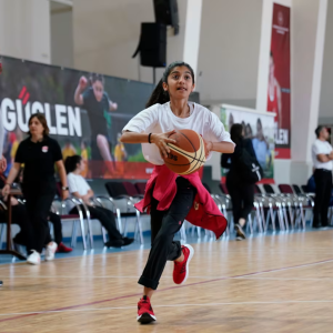 Student with a basketball