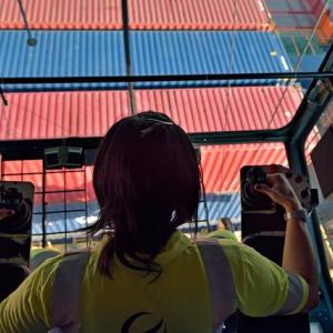 Employee operating crane