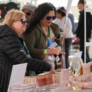 people at event booth