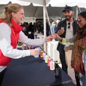 people at event booth
