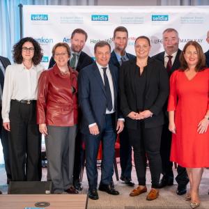 Ewa Kudlinska-Pyrz and others in a group photo at the conference