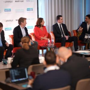 Ewa Kudlinska-Pyrz and others speaking on stage