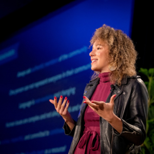 photo of Alexandra Legend Siegel speaking at a conference 