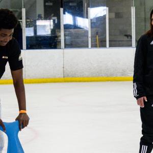 Students from ALLIANCE's BOSS program participate in a free skate session with Daryl Evans and Prospect Advisor Manon Rhéaume.