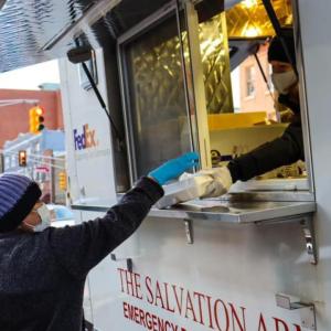 people getting food from food truck