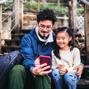 Father and Daughter on Phone